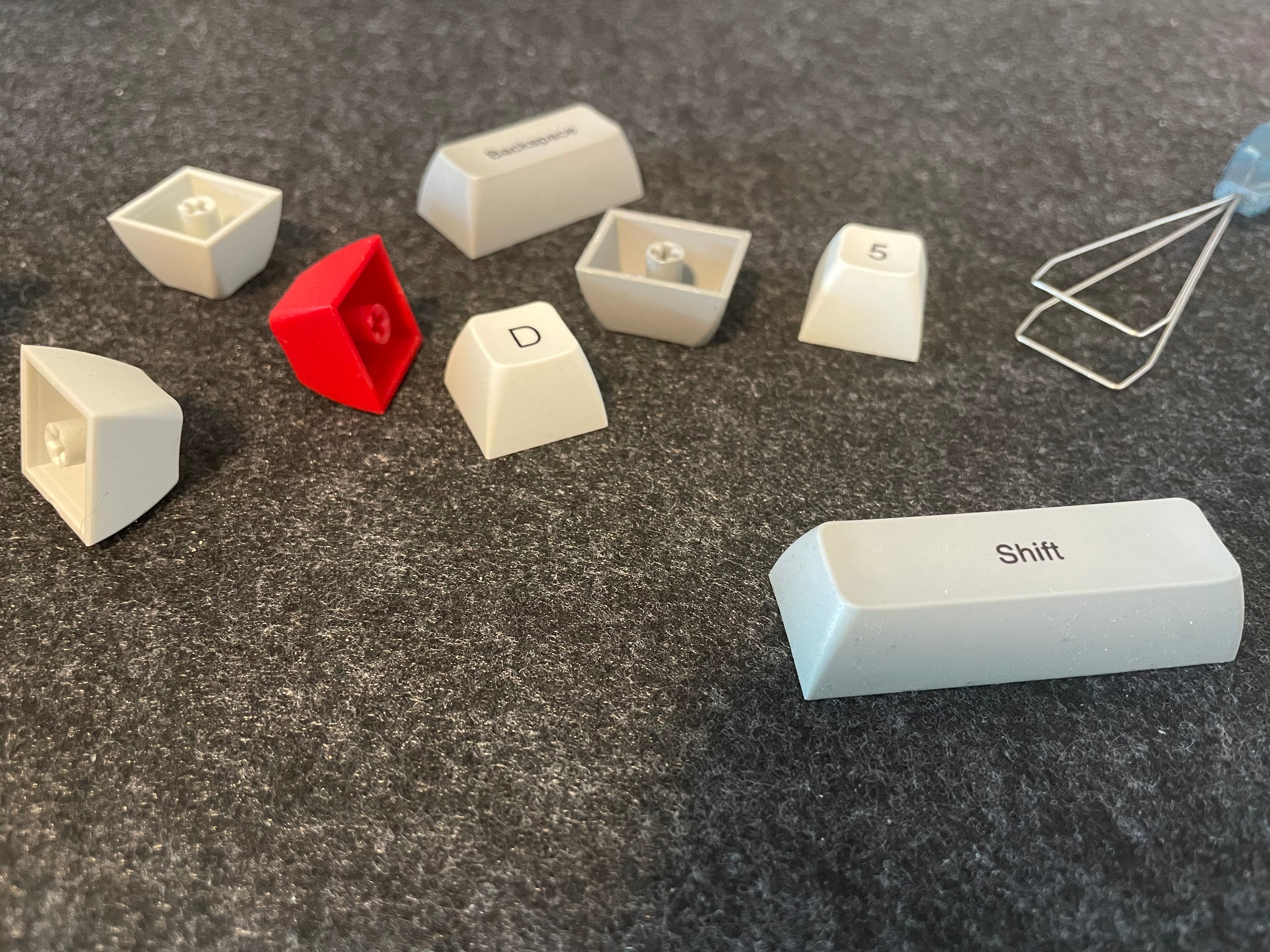What do the Differences Between ABS and PBT mean for Keycaps ONEofZERO